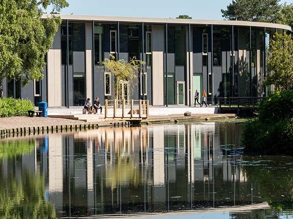 The GRID building seen across the loch, Edinburgh Campus