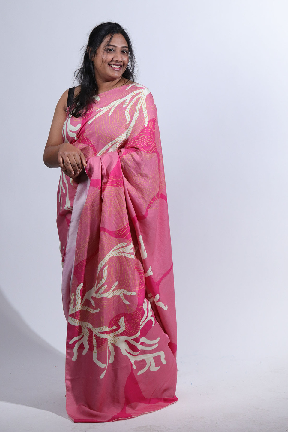 Woman wearing pink sari from the collection 'Revive' by Anula Narasimhan
