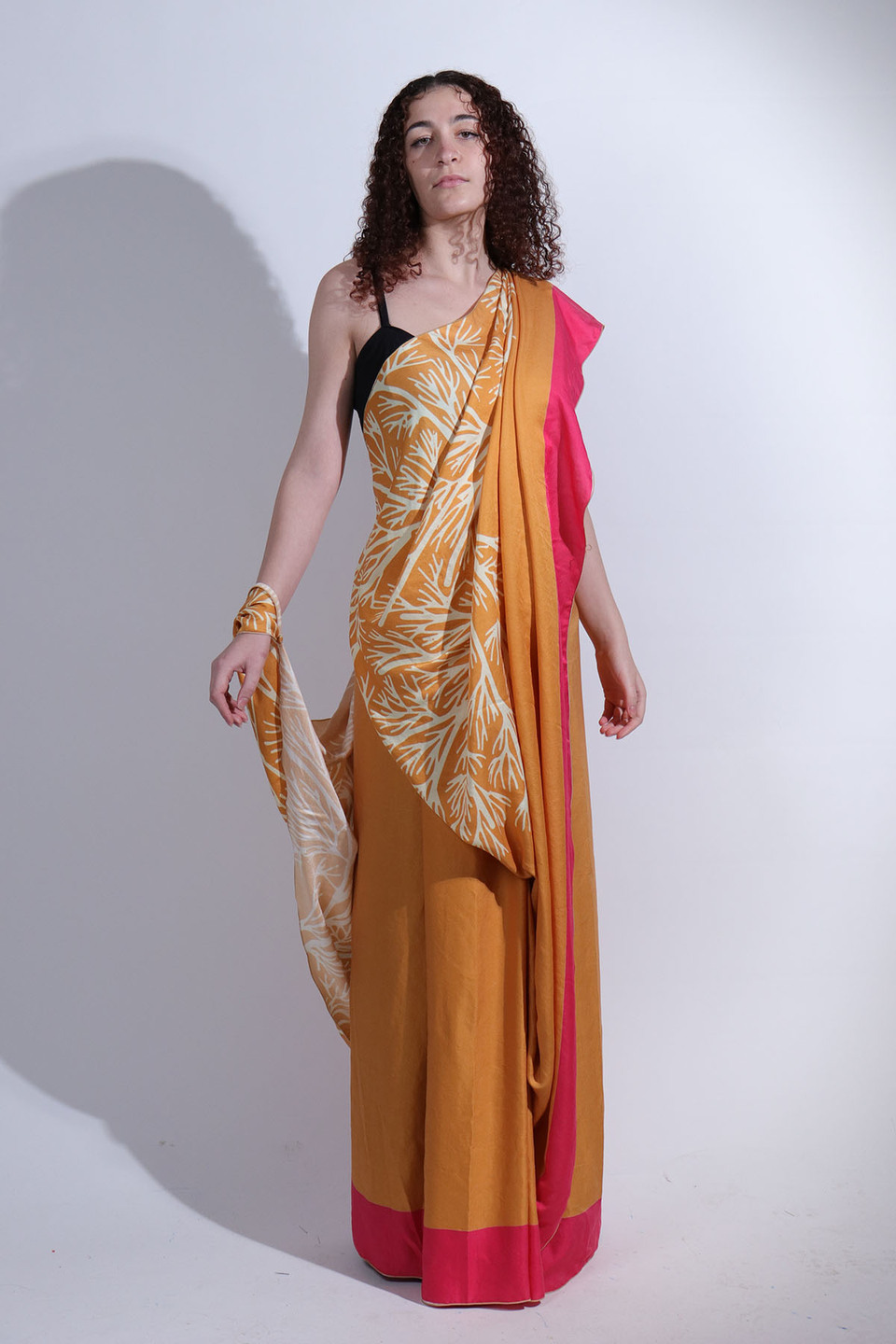 Model wearing pale brown sari from the collection 'Revive' by Anula Narasimhan