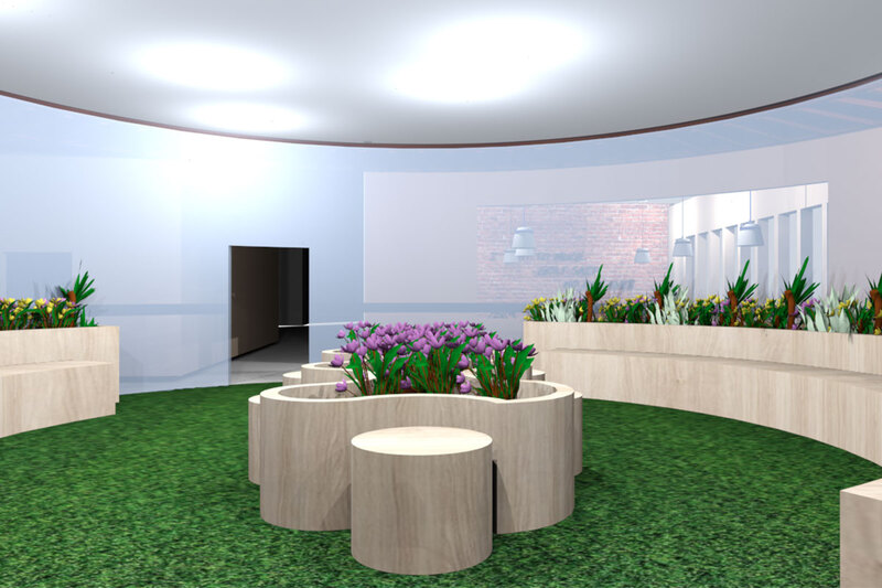A room with a circular table and a flower pot on top, adding a touch of nature to the interior decor.