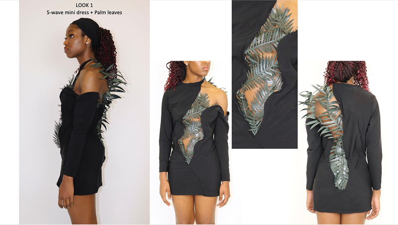 Woman models an S-wave single shouldered black mini dress with vertical ornate palm tree frond like metal inset in front and down the back from the left shoulder joining the fabric.