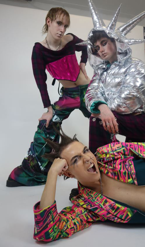 Three male models wear designs from the collection 'Wonderland: Where Boys Cry' by Matea Mandaric