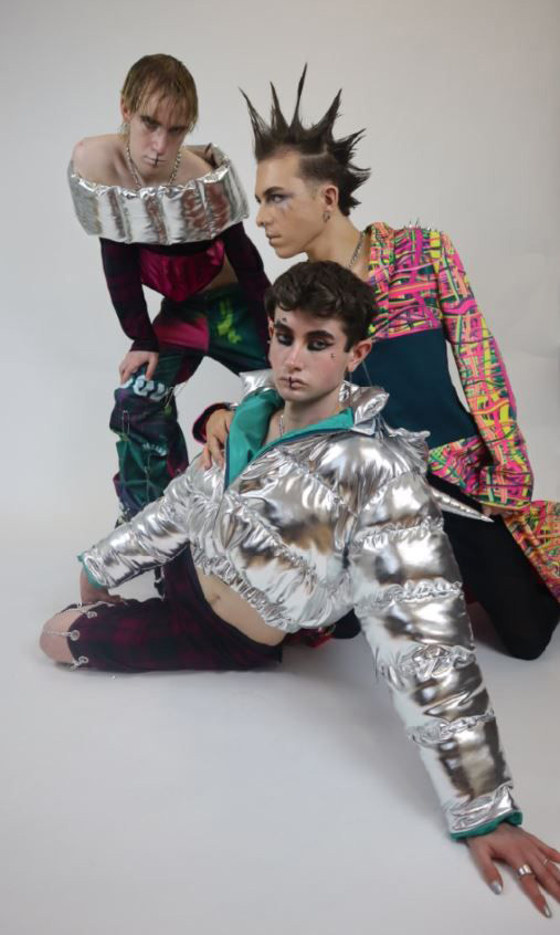 Three male models wear designs from the collection 'Wonderland: Where Boys Cry' by Matea Mandaric