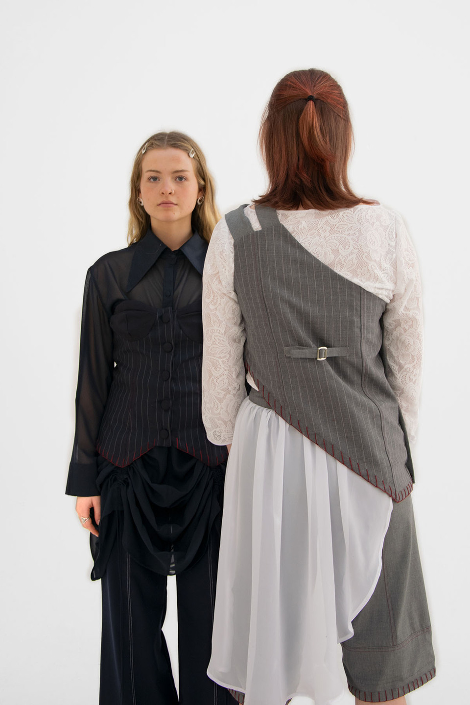 Two women model designs from the collection 'SKIN DEEP' by Sydney Omand