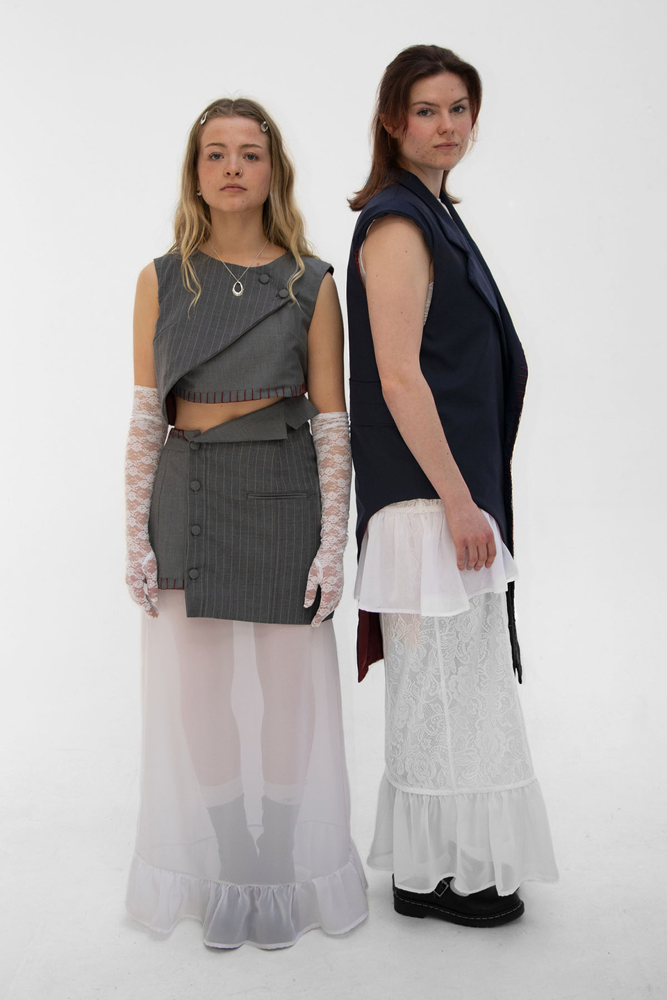 Two women model designs from the collection 'SKIN DEEP' by Sydney Omand